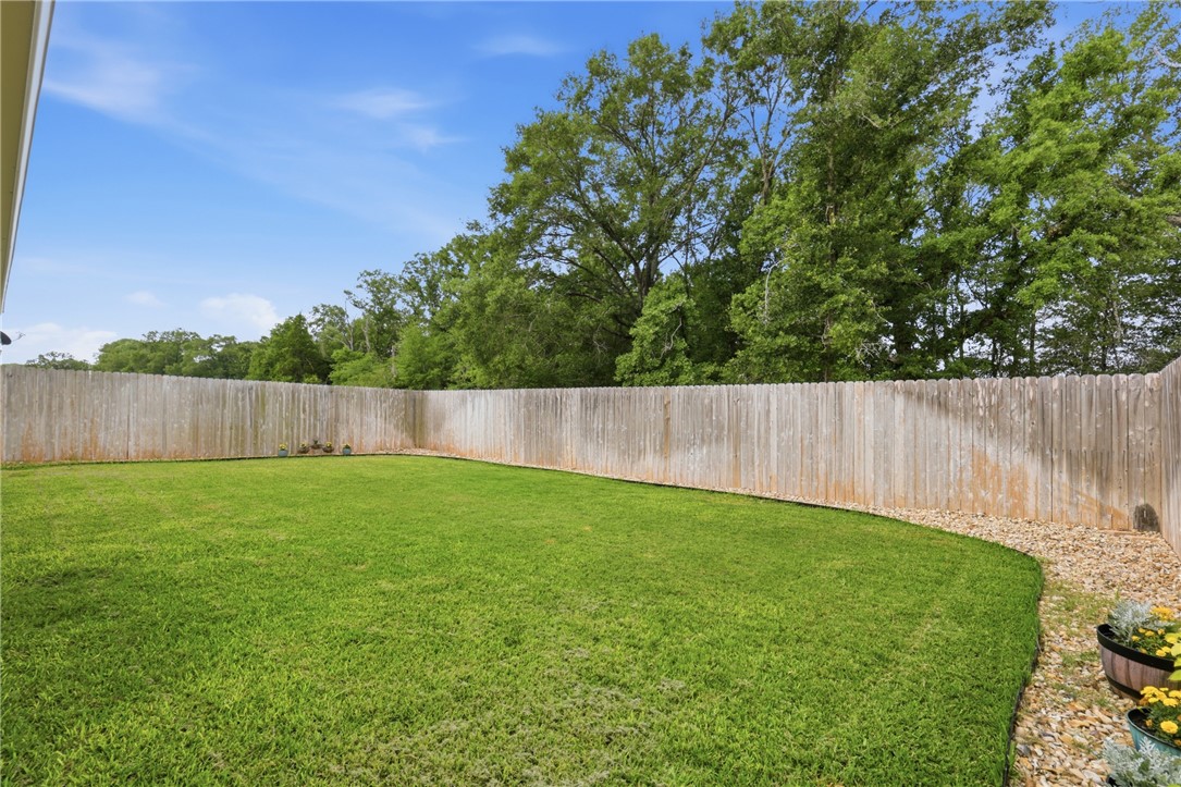 1943 Thorndyke Lane Bryan, TX 77807 - Photo 25 of 28 NO REAR NEIGHBORS! Enjoy the privacy of the greenbelt from your backyard