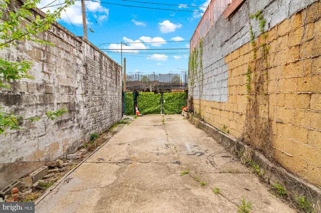 a view of a pathway both side of building