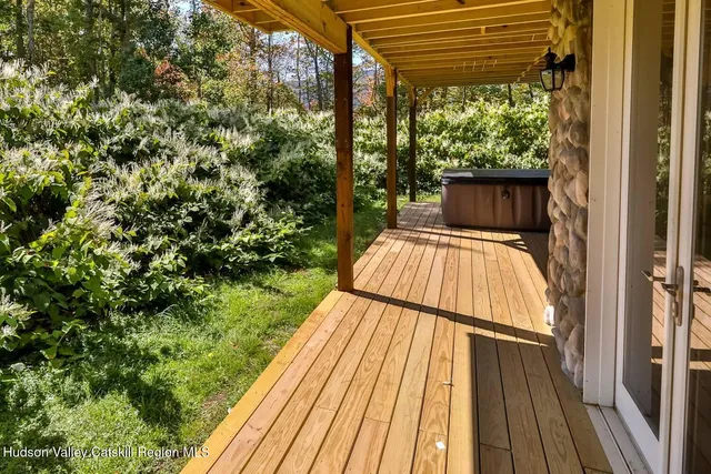 a view of balcony with wooden floor and outdoor space