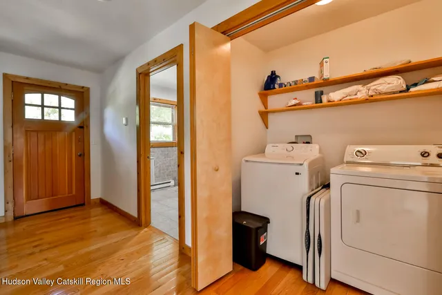 a view of a storage & utility room with washer and dryer
