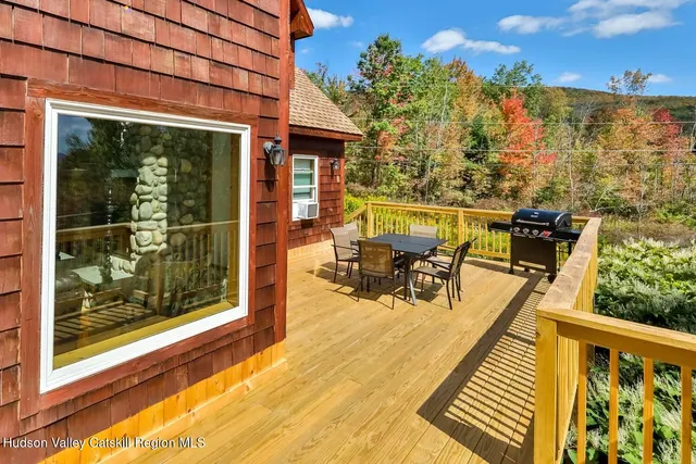 a view of a balcony with chairs