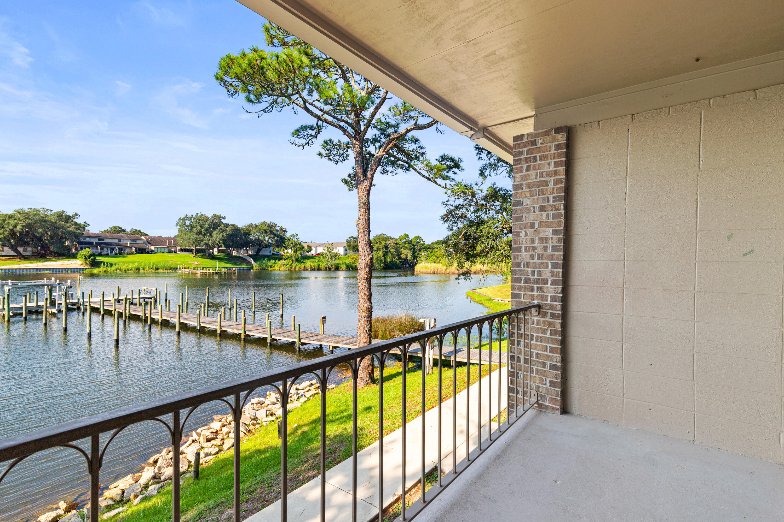 210 Pelham Road, Unit 109B Fort Walton Beach, FL 32547 - Photo 17 of 33 a view of swimming pool from a balcony