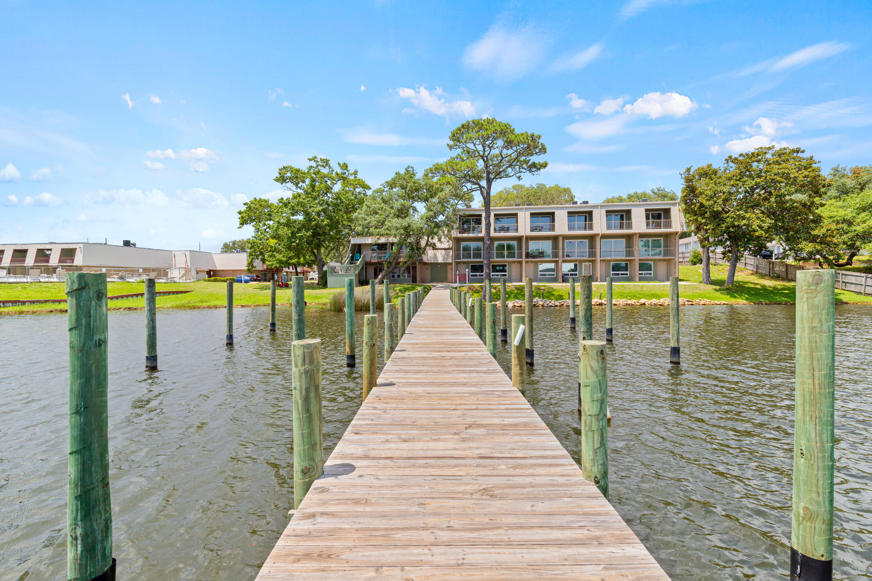 210 Pelham Road, Unit 109B Fort Walton Beach, FL 32547 - Photo 25 of 33 a view of swimming pool with outdoor seating and city view