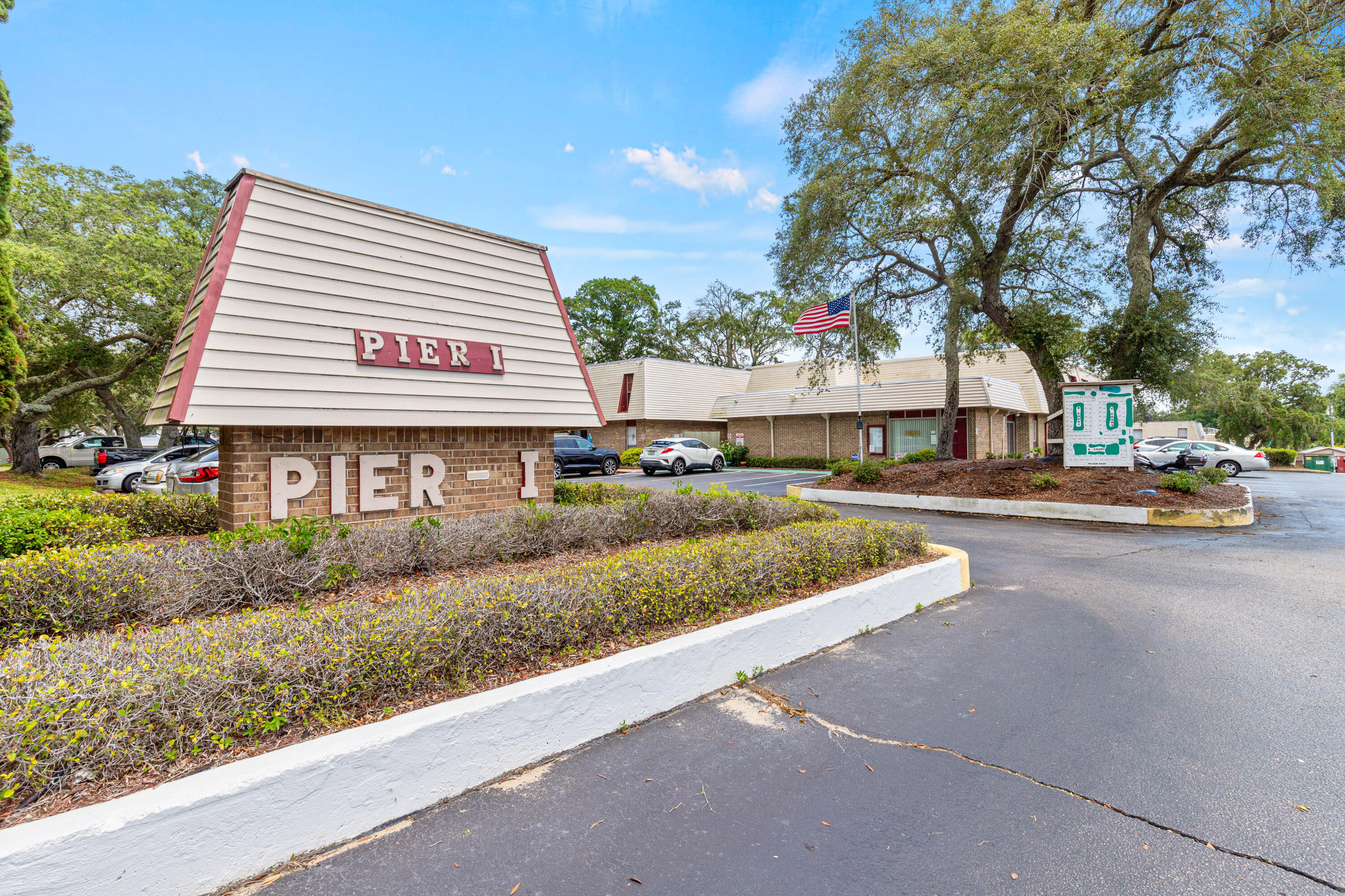 210 Pelham Road, Unit 109B Fort Walton Beach, FL 32547 - Photo 27 of 33 a view of a street with houses