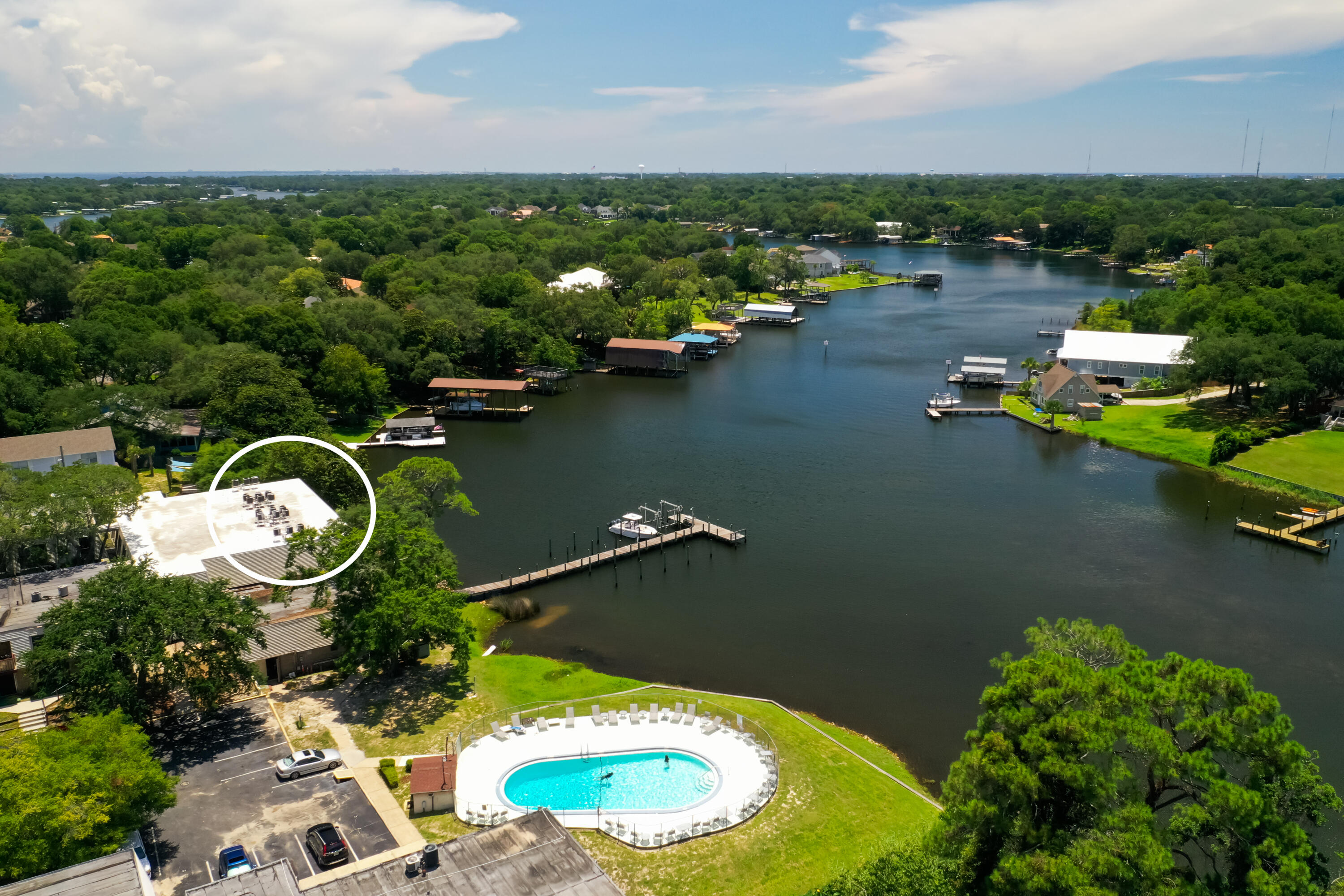 210 Pelham Road, Unit 109B Fort Walton Beach, FL 32547 - Photo 32 of 33 an aerial view of a house with a lake view