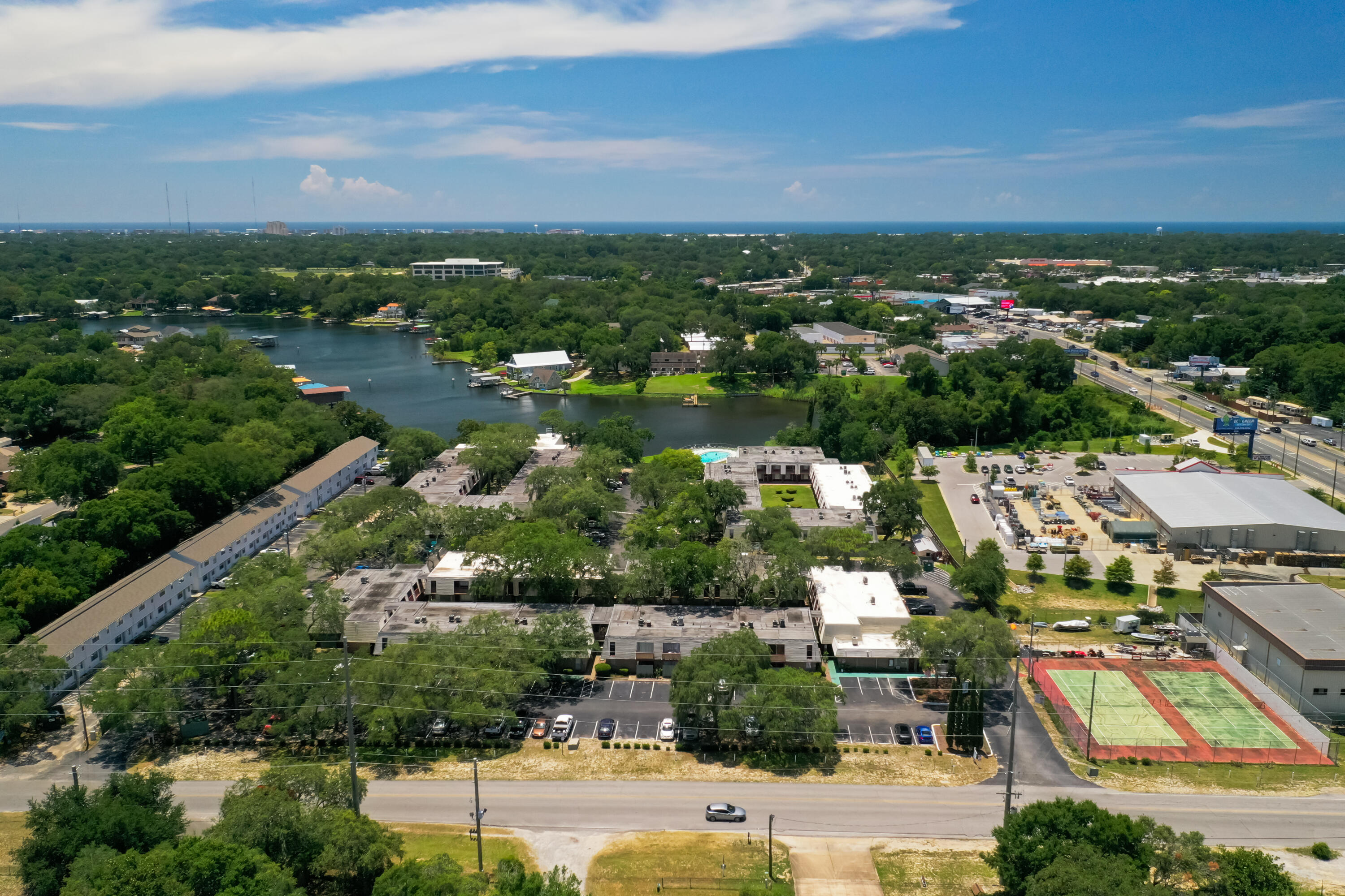 210 Pelham Road, Unit 109B Fort Walton Beach, FL 32547 - Photo 33 of 33 an aerial view of a city with lots of residential buildings