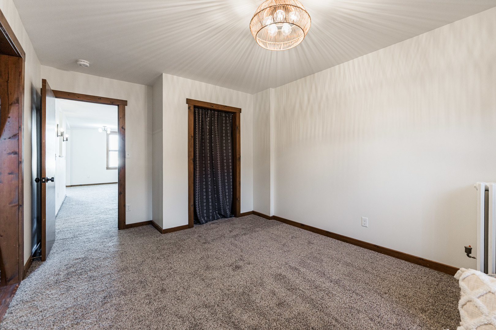 318 West State Street, Unit 318 Sycamore, IL 60178 - Photo 15 of 21 an empty room with a view of a hallway