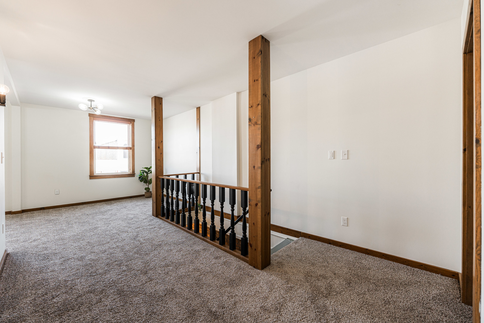 318 West State Street, Unit 318 Sycamore, IL 60178 - Photo 6 of 21 an empty room with windows