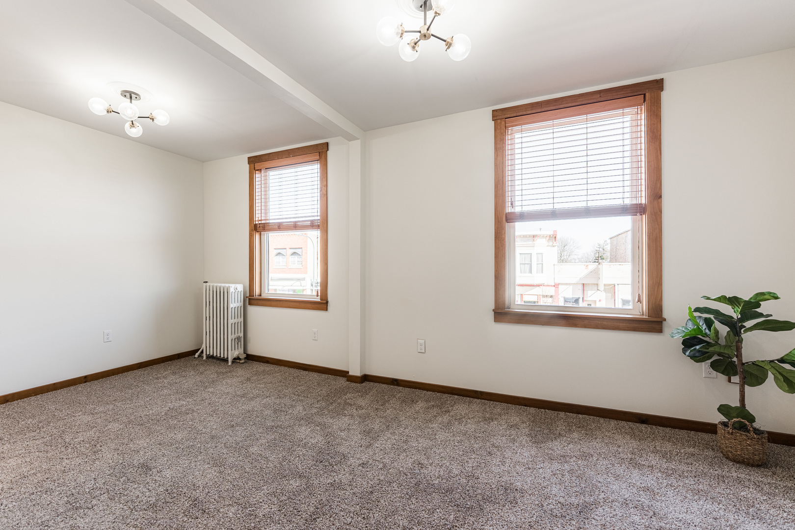 318 West State Street, Unit 318 Sycamore, IL 60178 - Photo 7 of 21 a view of an empty room with a window