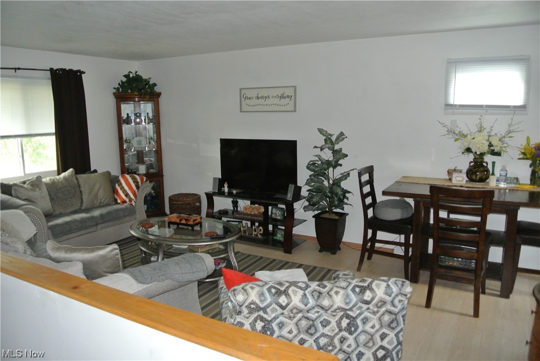 4418-4422 Maplepark Road Stow, OH 44224 - Photo 4 of 32 Hardwood floored living room with a wealth of natural light