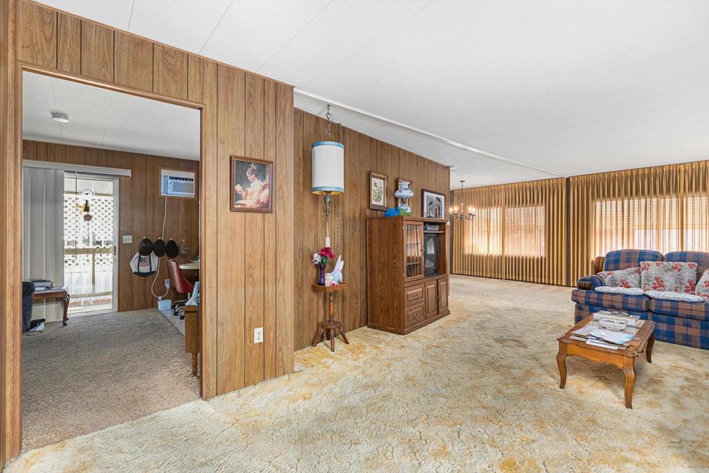 65 Brookside Lane Oceanside, CA 92056 - Photo 7 of 28 a view of a livingroom with furniture and windows