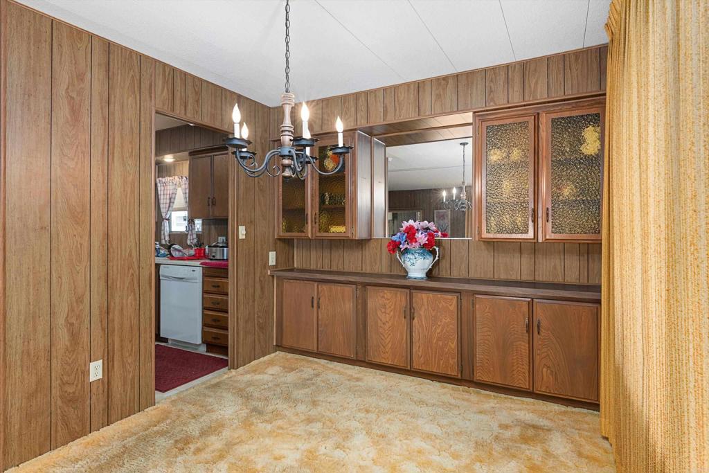 65 Brookside Lane Oceanside, CA 92056 - Photo 10 of 28 a view of a hallway kitchen and dining room