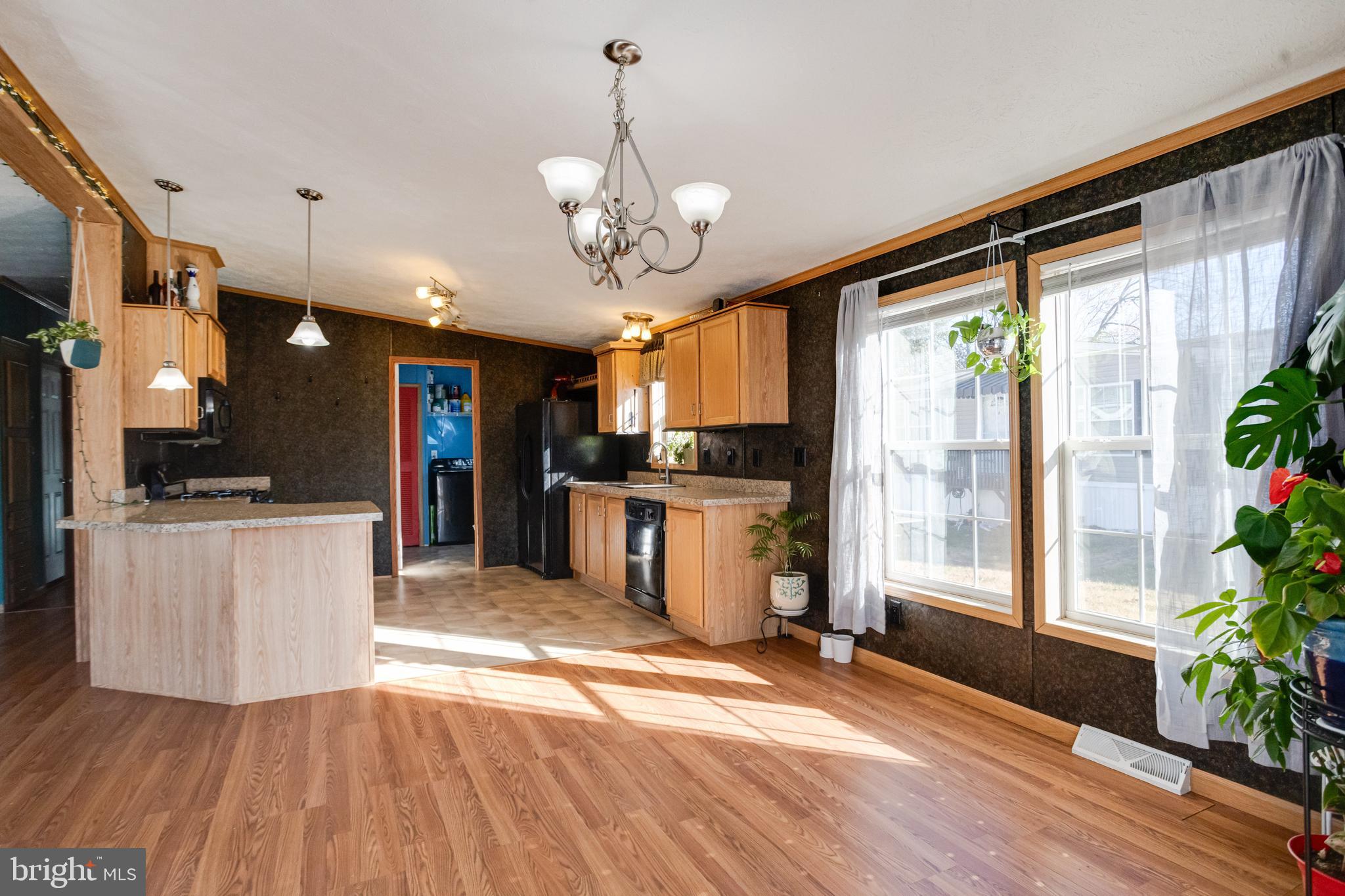 488 North Patuxent Road, Unit 18A Odenton, MD 21113 - Photo 11 of 34 a view of a kitchen with microwave and refrigerator