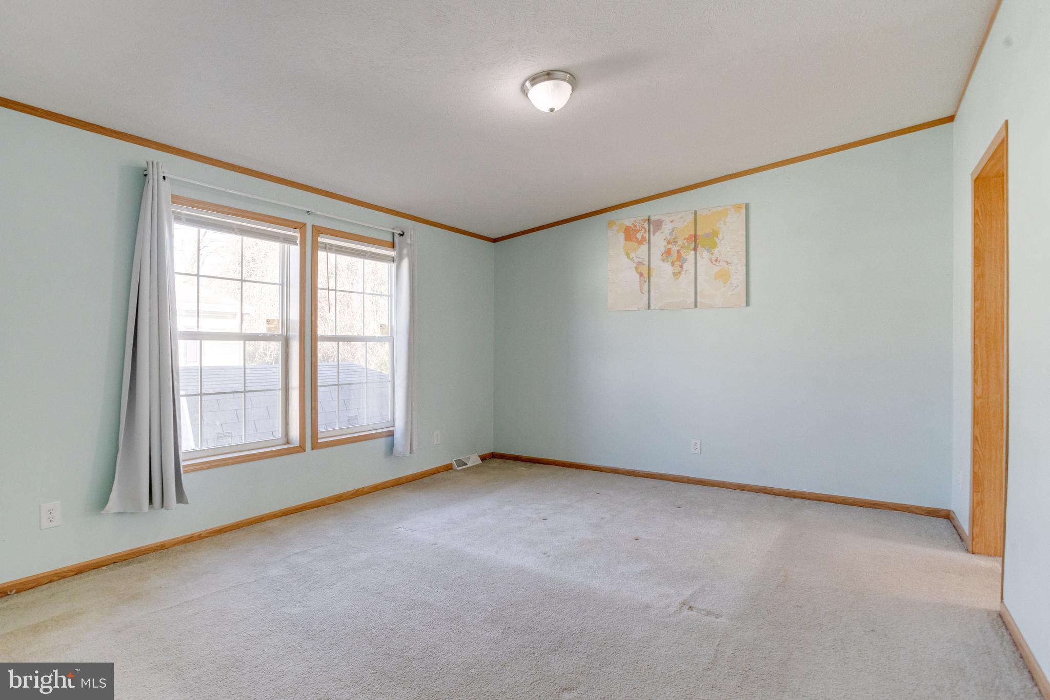 488 North Patuxent Road, Unit 18A Odenton, MD 21113 - Photo 17 of 34 an empty room with a empty space and windows