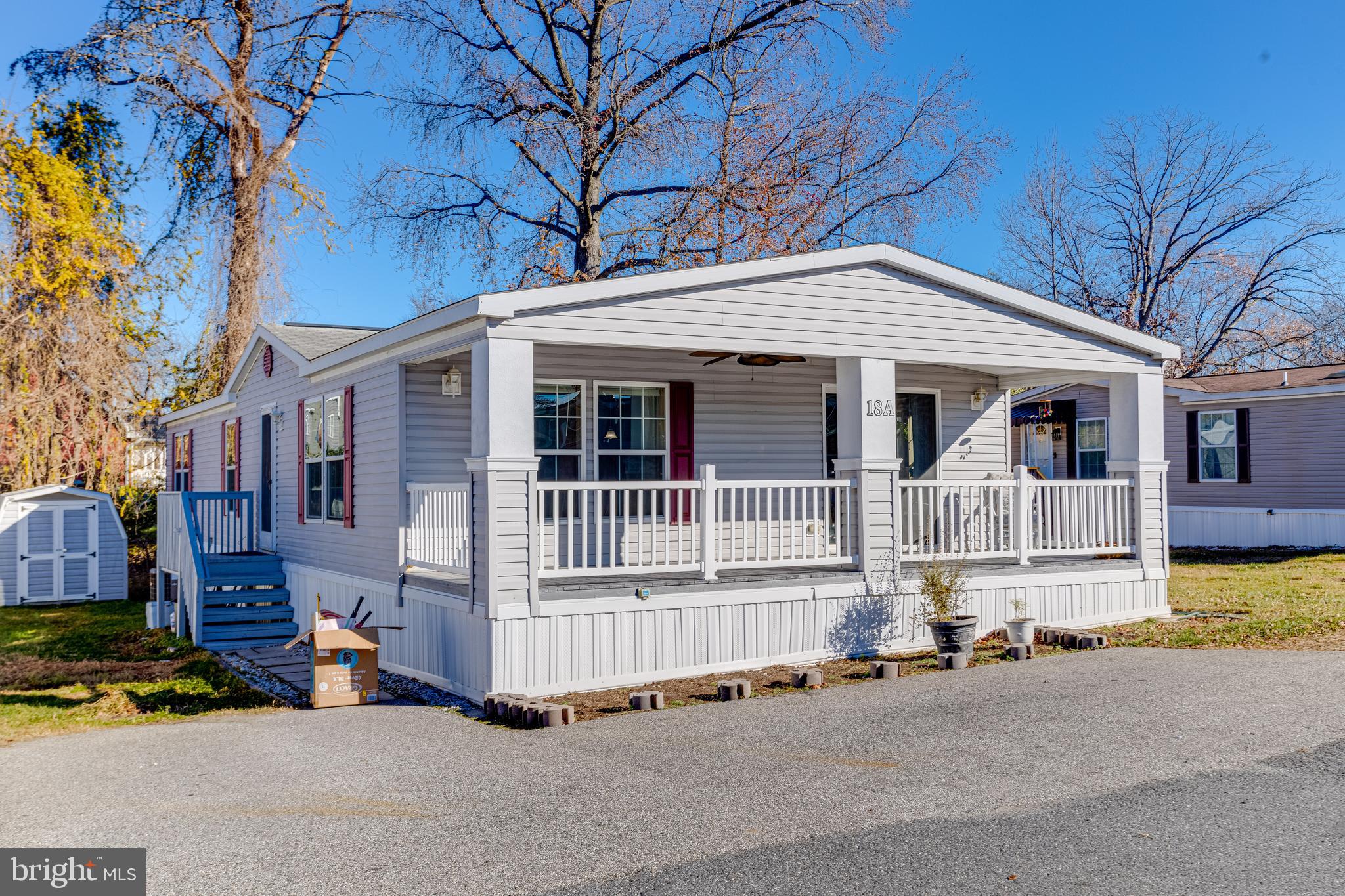 488 North Patuxent Road, Unit 18A Odenton, MD 21113 - Photo 2 of 34 a front view of a house with a garage
