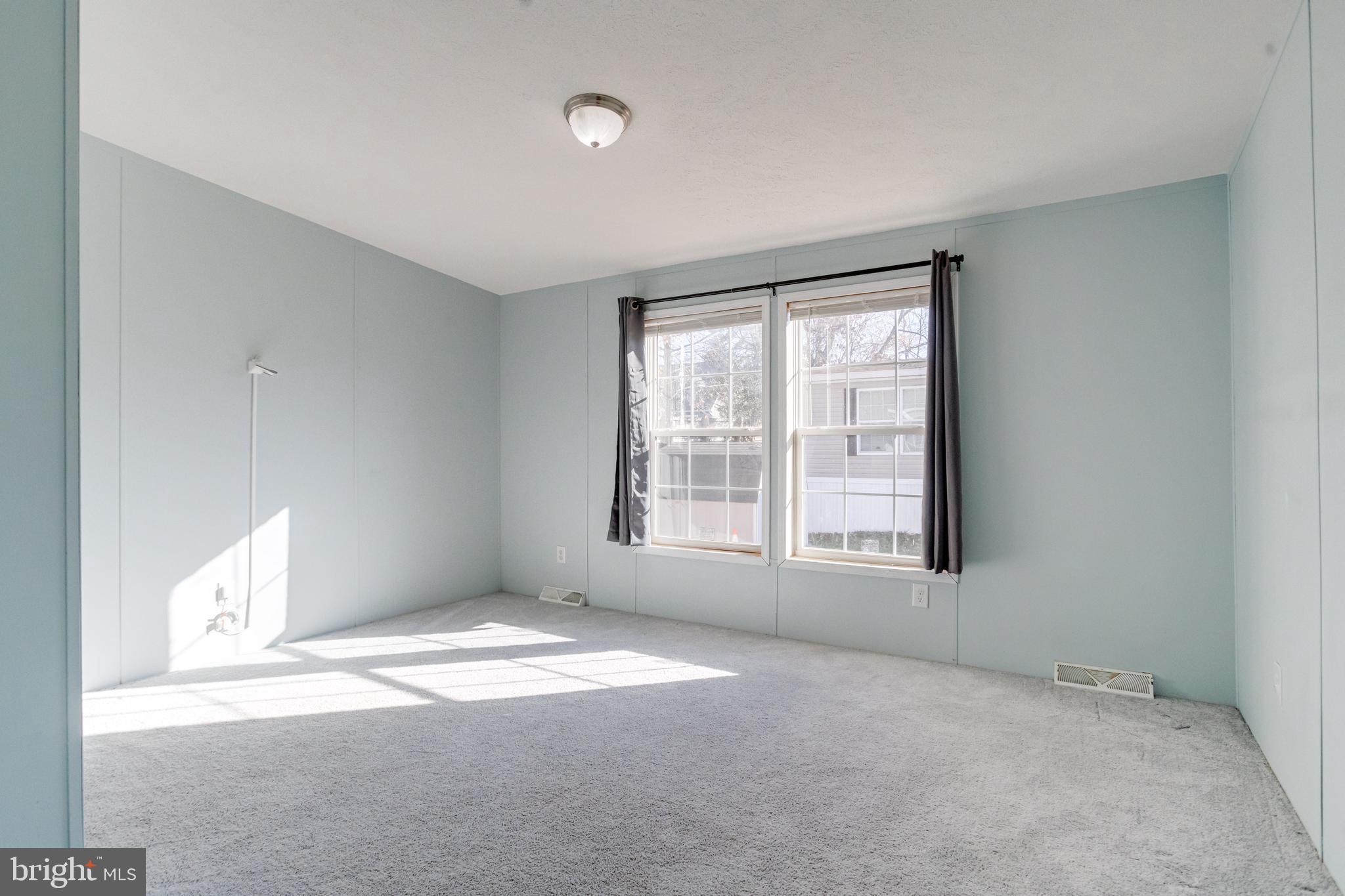 488 North Patuxent Road, Unit 18A Odenton, MD 21113 - Photo 24 of 34 a view of an empty room with a window