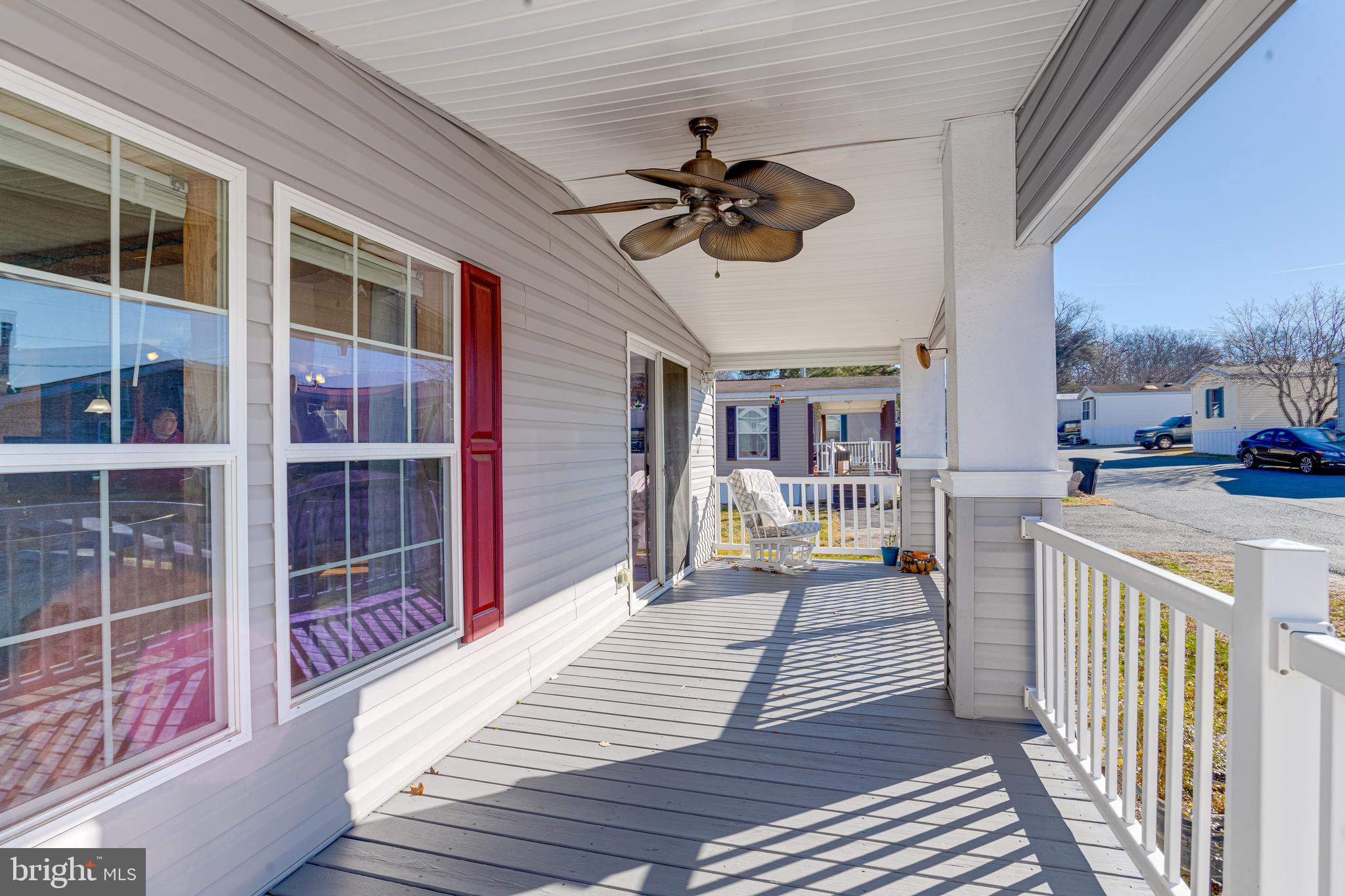 488 North Patuxent Road, Unit 18A Odenton, MD 21113 - Photo 33 of 34 a view of a porch with wooden floor and fence