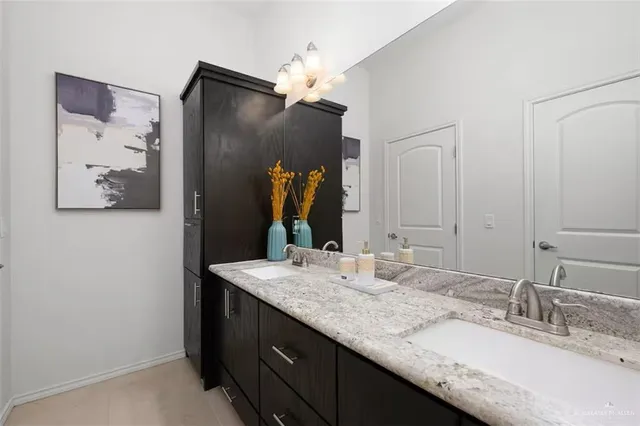 a bathroom with a toilet and a mirror