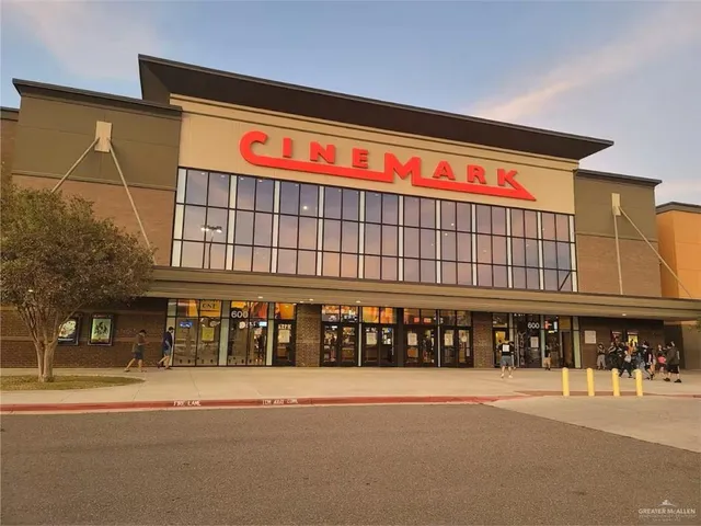 a front view of a building with garden