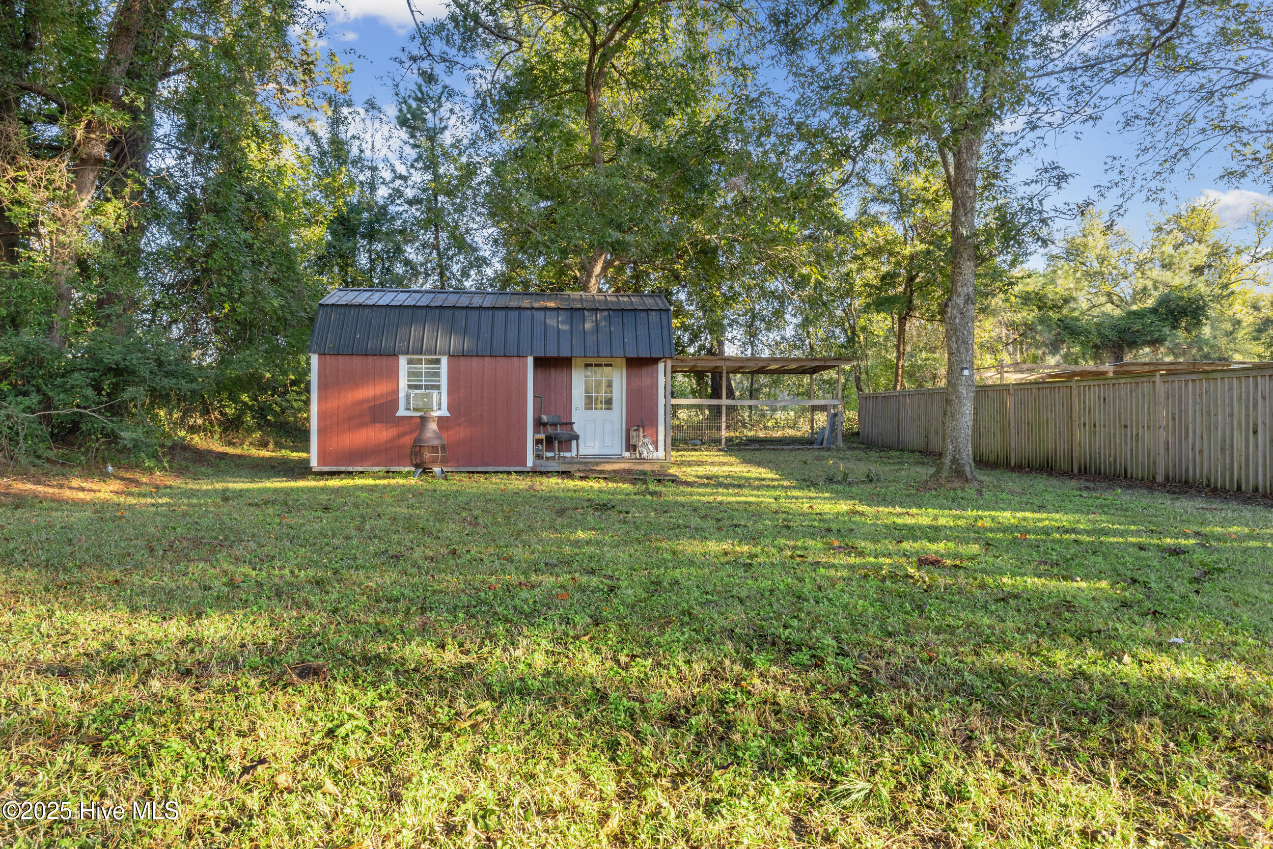627 Ludie Brown Road Chinquapin, NC 28521 - Photo 13 of 16 storage shed