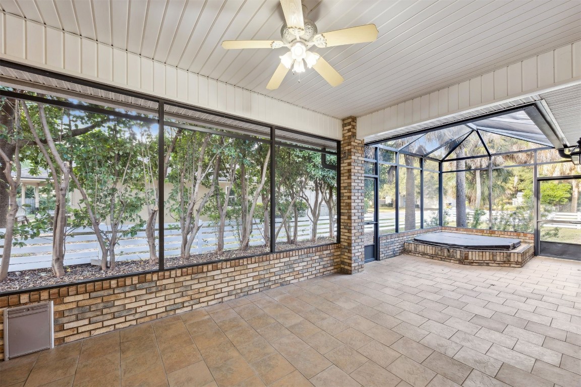 96286 Springwood Lane Fernandina Beach, FL 32034 - Photo 11 of 59 Expansive covered and screened patio including bird cage screen for natural light.