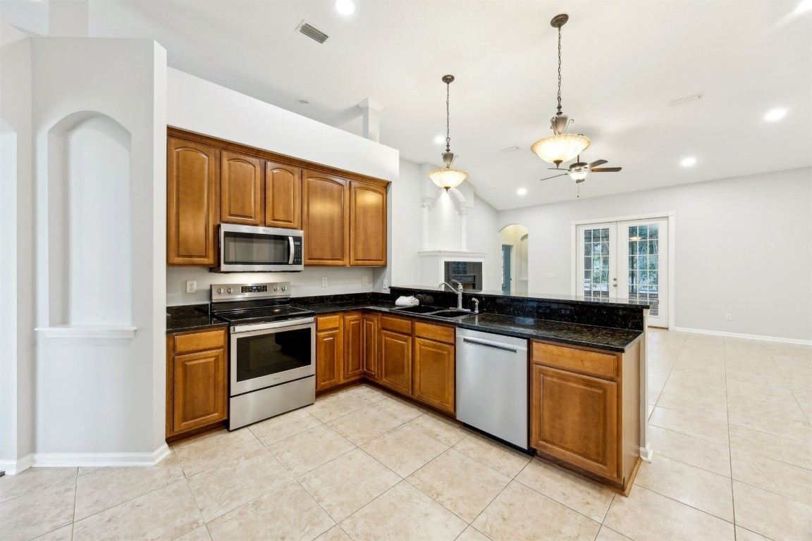 96286 Springwood Lane Fernandina Beach, FL 32034 - Photo 27 of 59 Stainless appliances, granite counters, plenty of space
