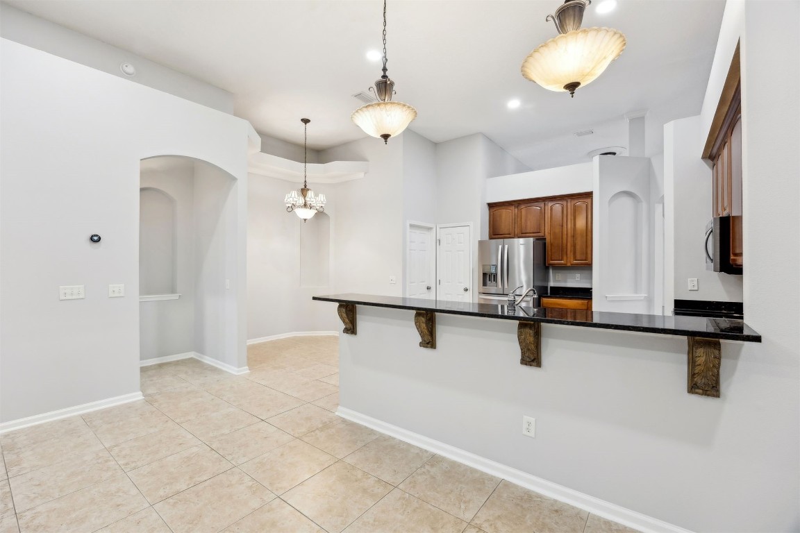 96286 Springwood Lane Fernandina Beach, FL 32034 - Photo 29 of 59 Kitchen bar open to family room