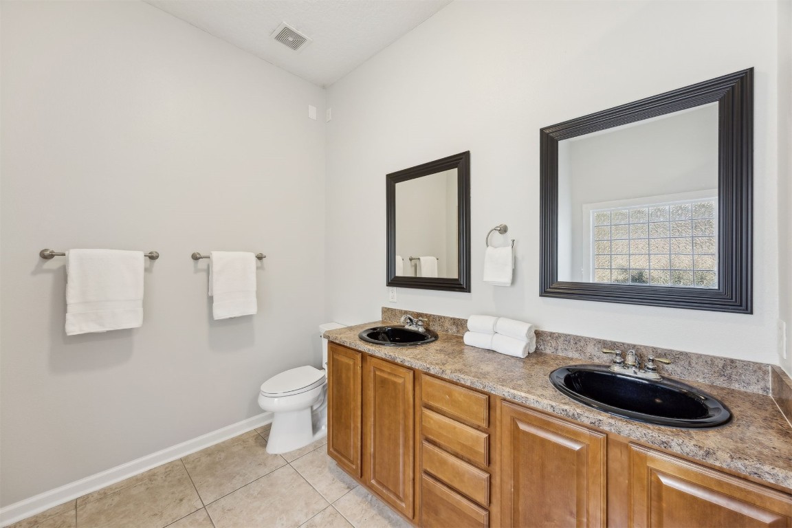 96286 Springwood Lane Fernandina Beach, FL 32034 - Photo 36 of 59 Owner's suite bathroom, dual sink vanity