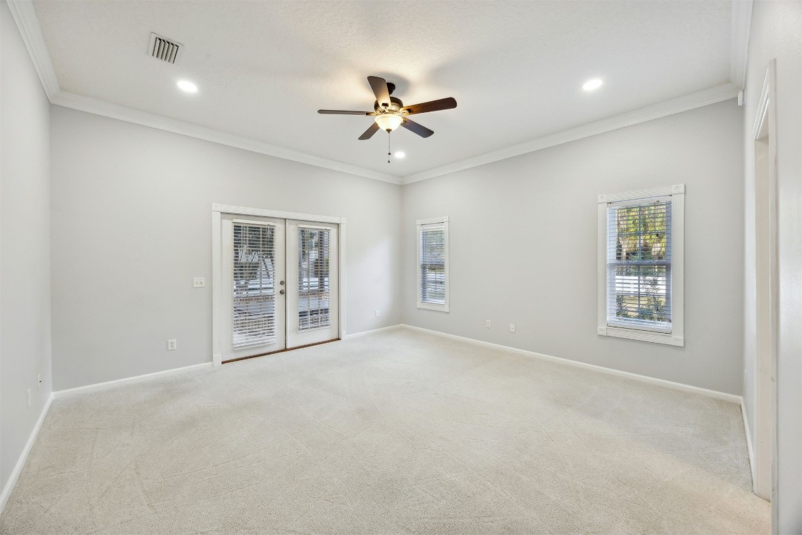 96286 Springwood Lane Fernandina Beach, FL 32034 - Photo 10 of 59 Owner's suite with french doors to the patio