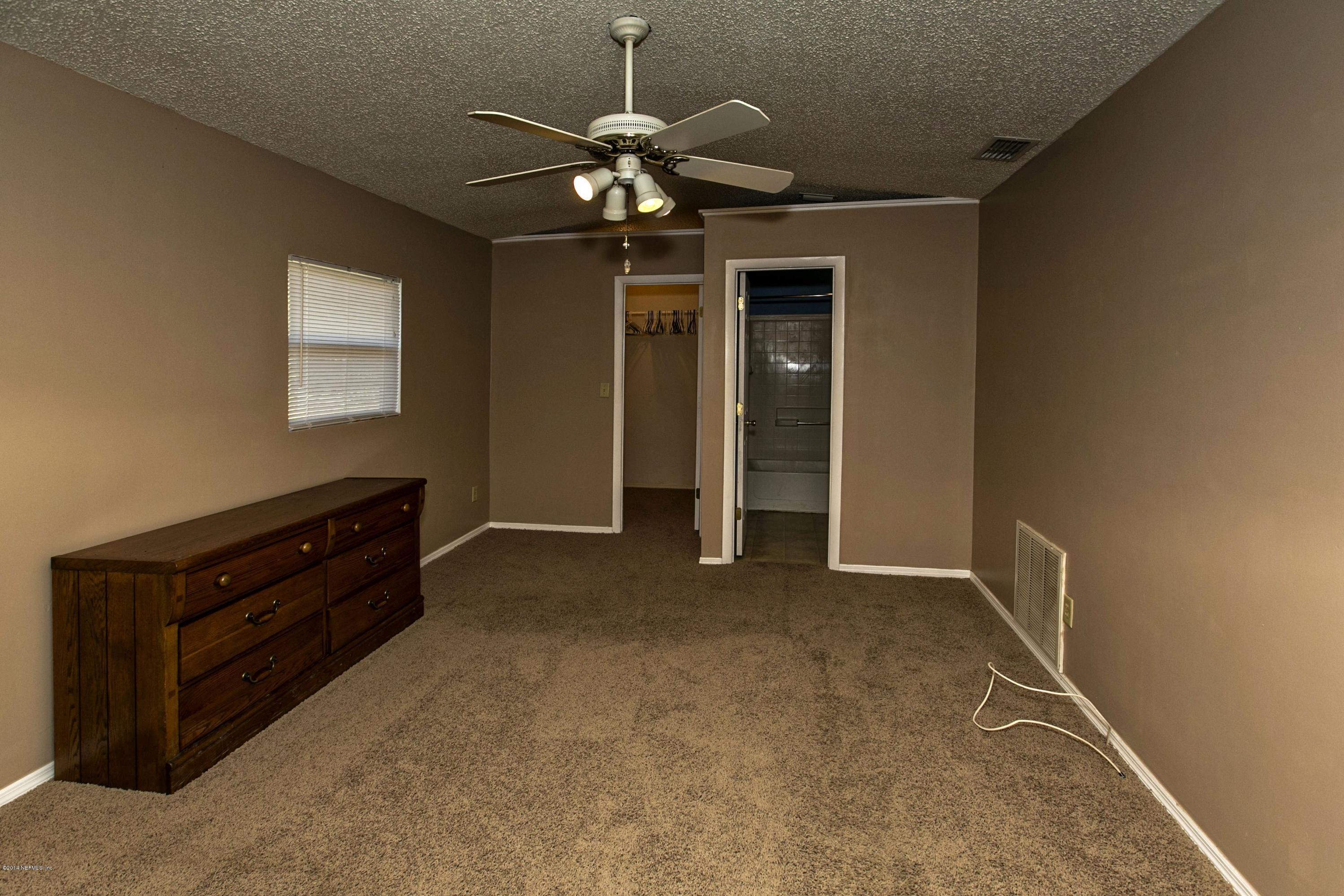 11668 Wynell Road Jacksonville, FL 32218 - Photo 8 of 17 010_Master Bedroom