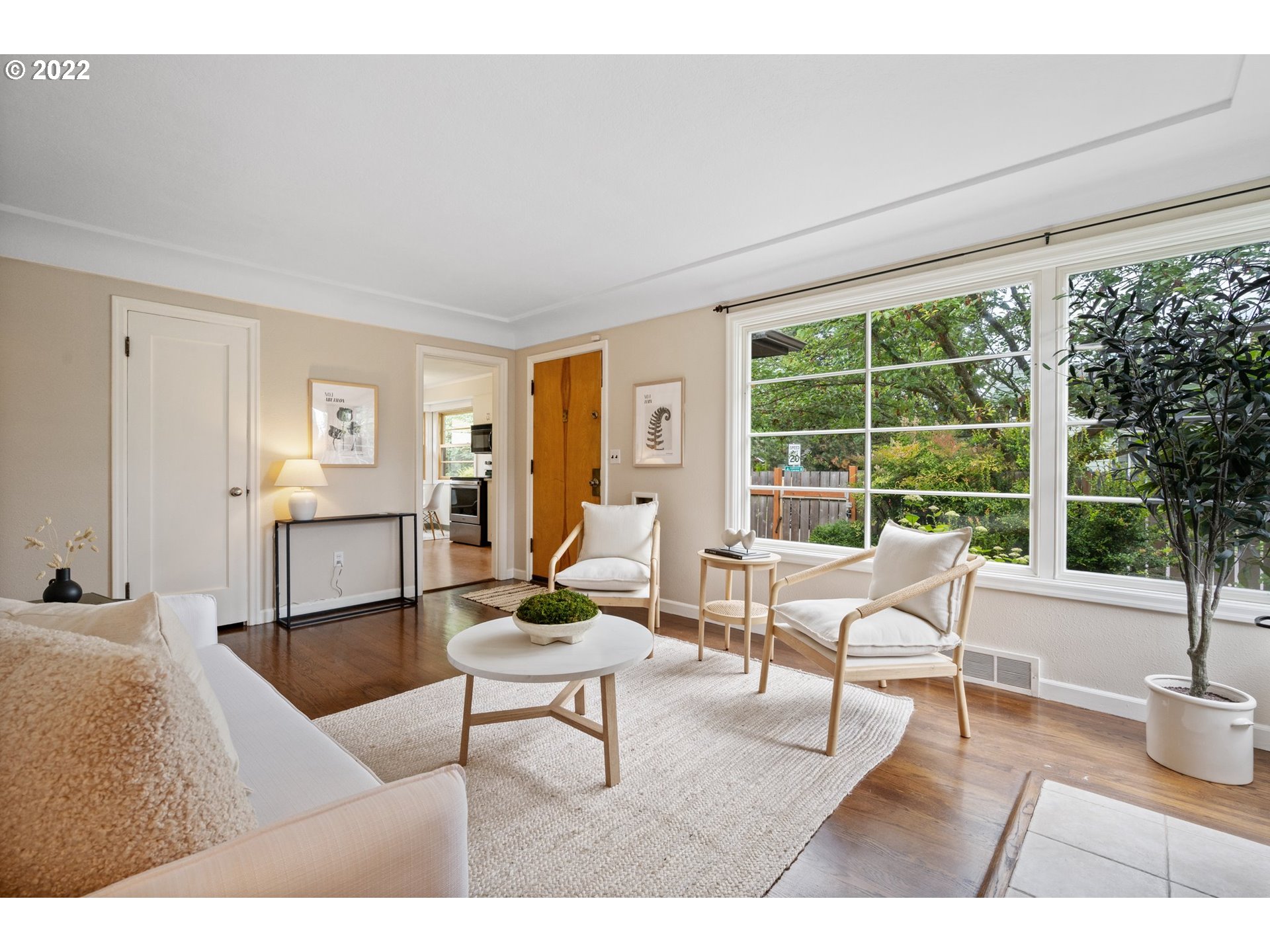3286 Northeast Holman Street Portland, OR 97211 - Photo 11 of 25 a living room with furniture and a large window