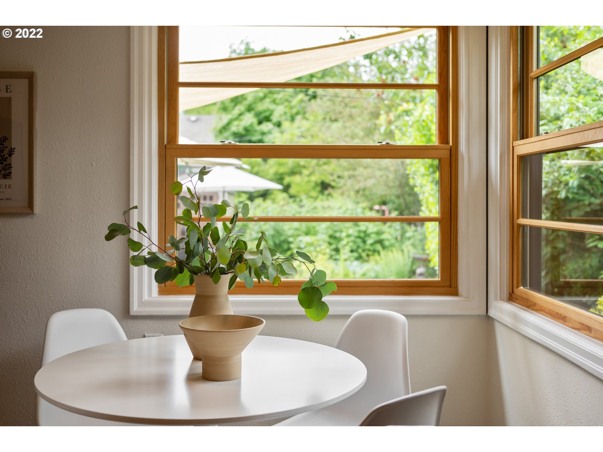 3286 Northeast Holman Street Portland, OR 97211 - Photo 13 of 25 a view of a dining room with furniture window and outside view