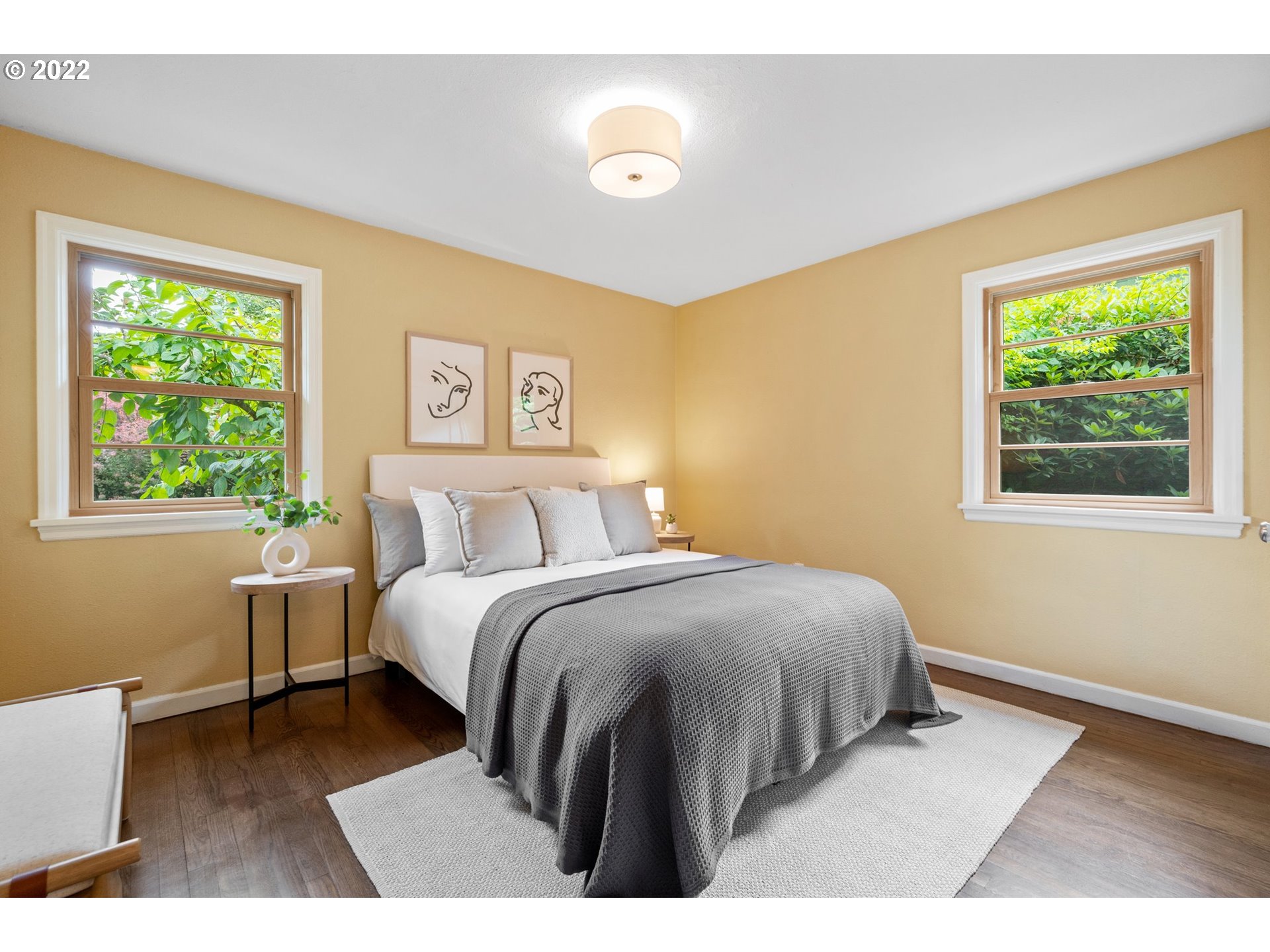 3286 Northeast Holman Street Portland, OR 97211 - Photo 14 of 25 a bedroom with a bed and a window