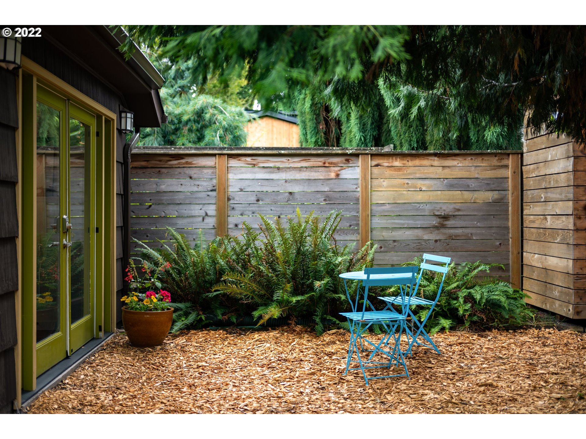 3286 Northeast Holman Street Portland, OR 97211 - Photo 21 of 25 a view of a backyard with sitting area