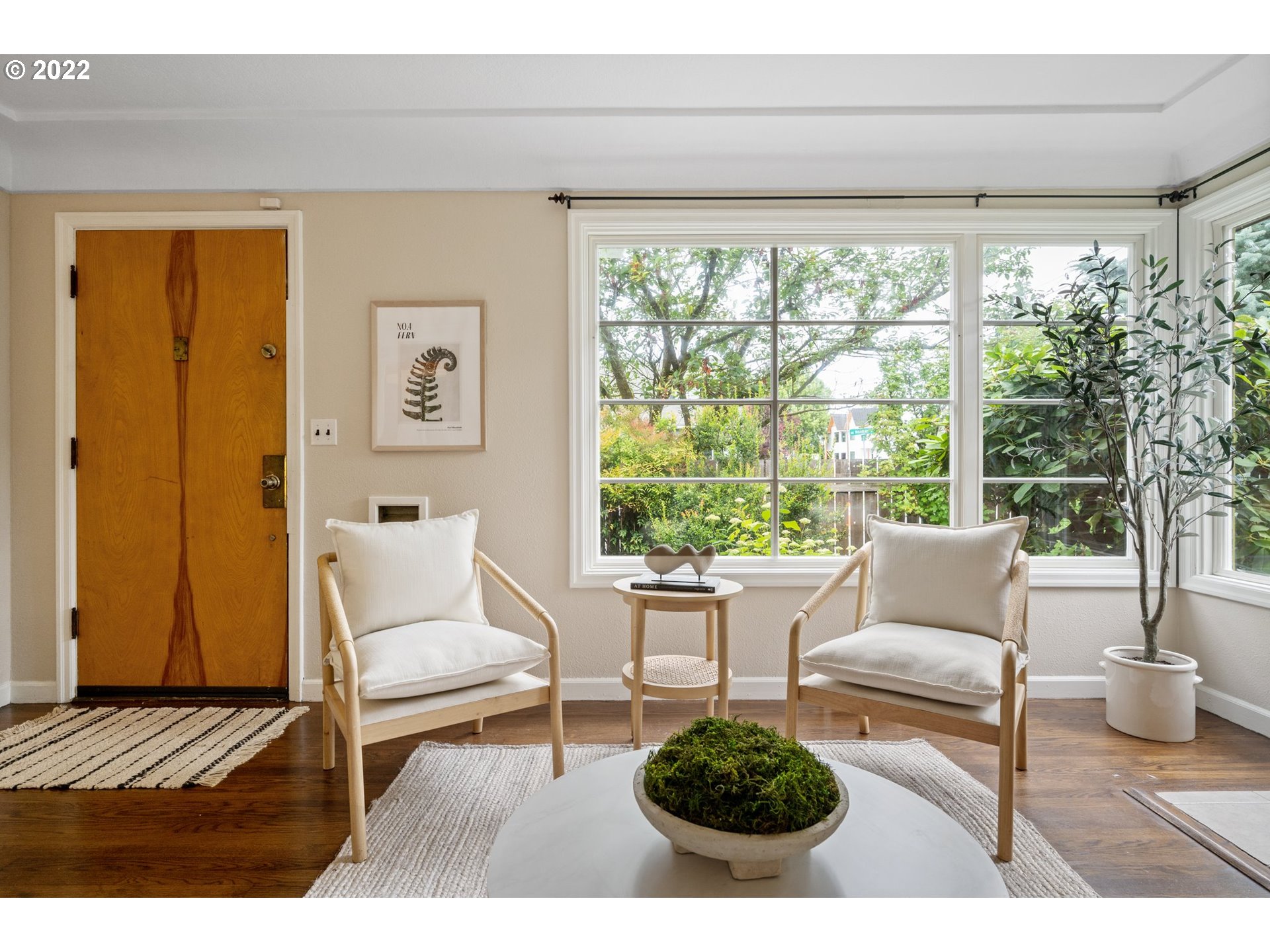3286 Northeast Holman Street Portland, OR 97211 - Photo 9 of 25 a living room with furniture and a large window