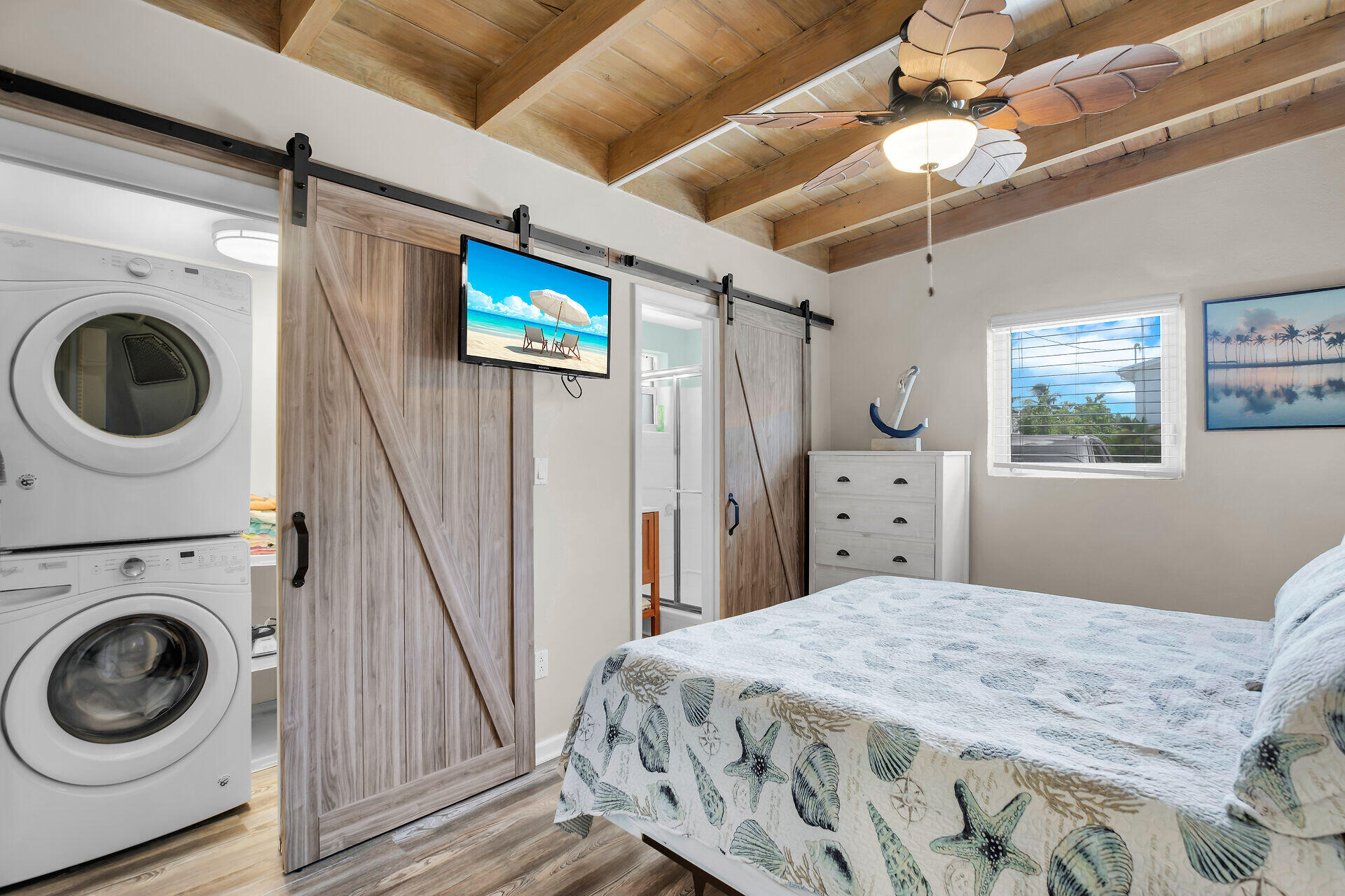 211 5th Street Key Colony Beach, FL 33051 - Photo 13 of 28 a bedroom with a bed and a television