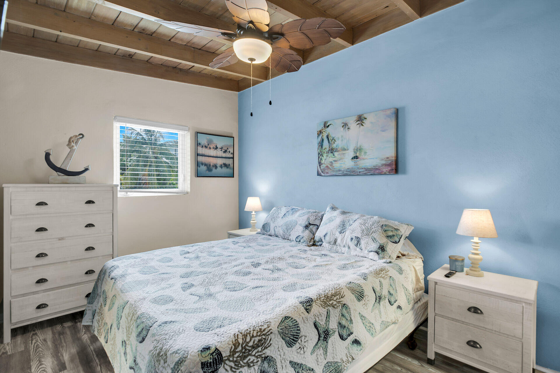 211 5th Street Key Colony Beach, FL 33051 - Photo 14 of 28 a bedroom with a bed and a dresser