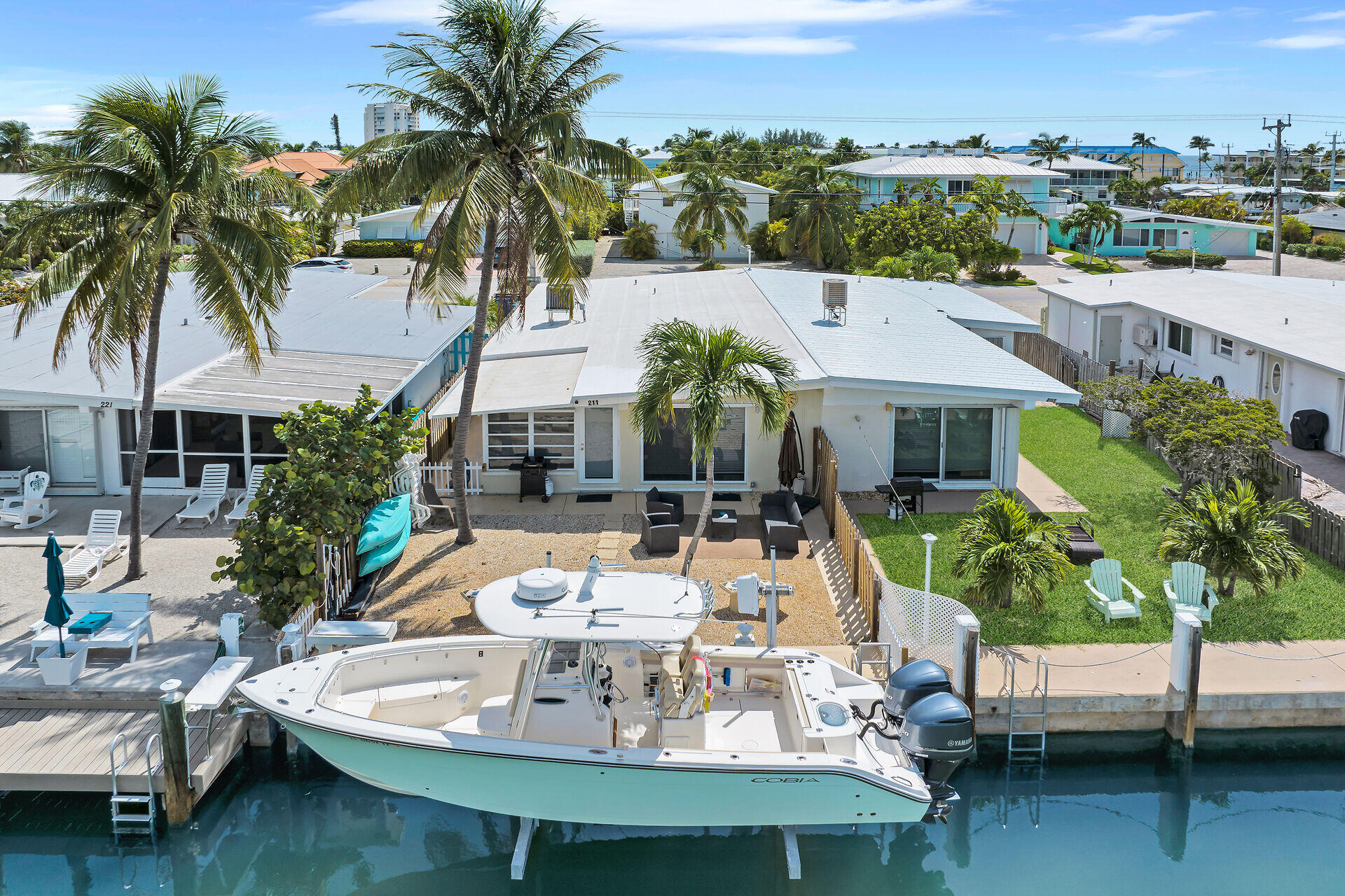 211 5th Street Key Colony Beach, FL 33051 - Photo 19 of 28 a view of house with swimming pool and patio