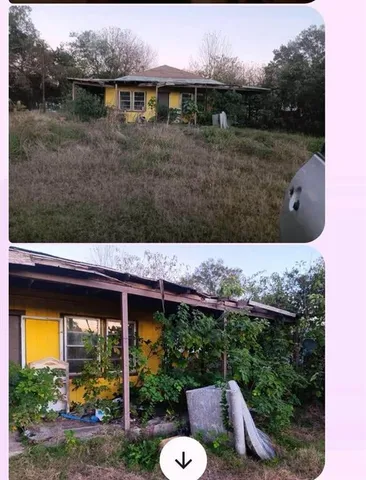 a view of backyard with swimming pool and outdoor seating