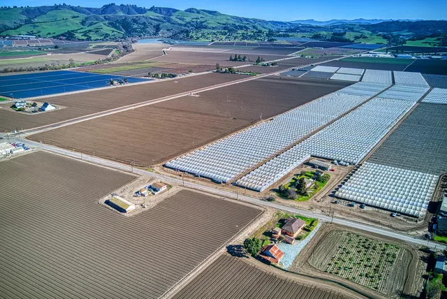 an aerial view of a house with a outdoor space
