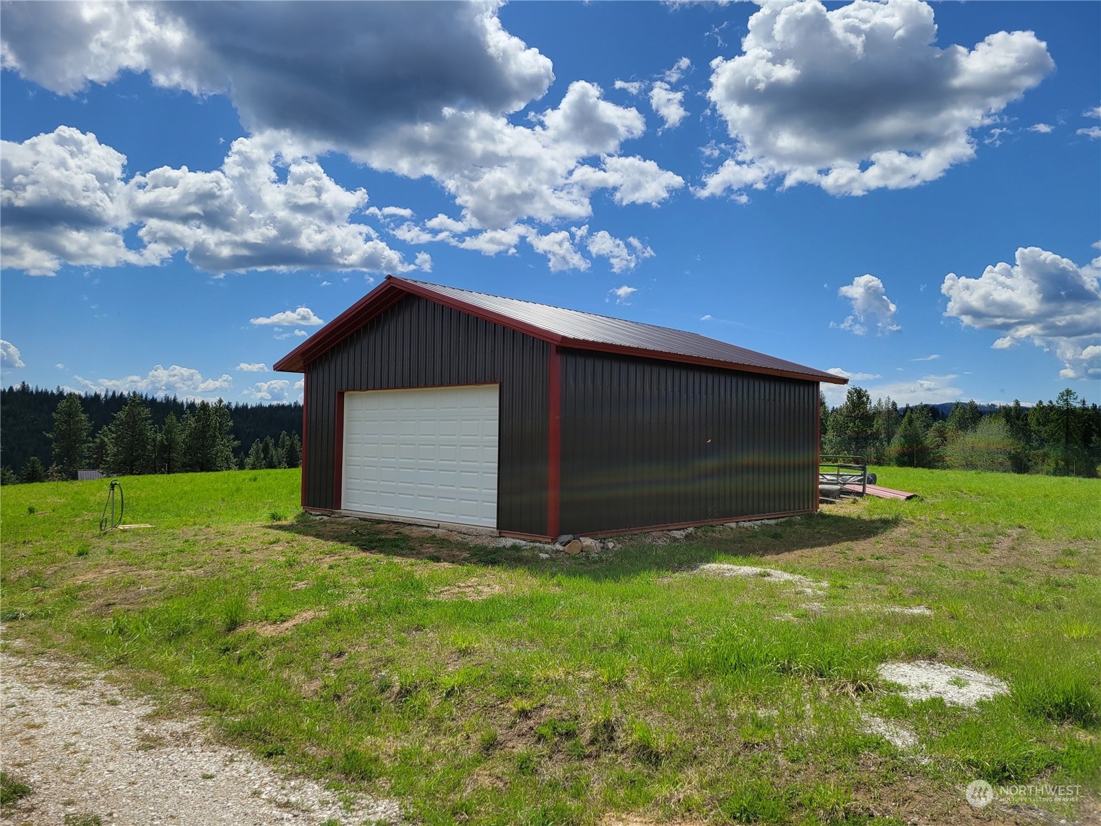 5099 M Allen Road Springdale, WA 99173 - Photo 1 of 38 a view of a backyard of the house