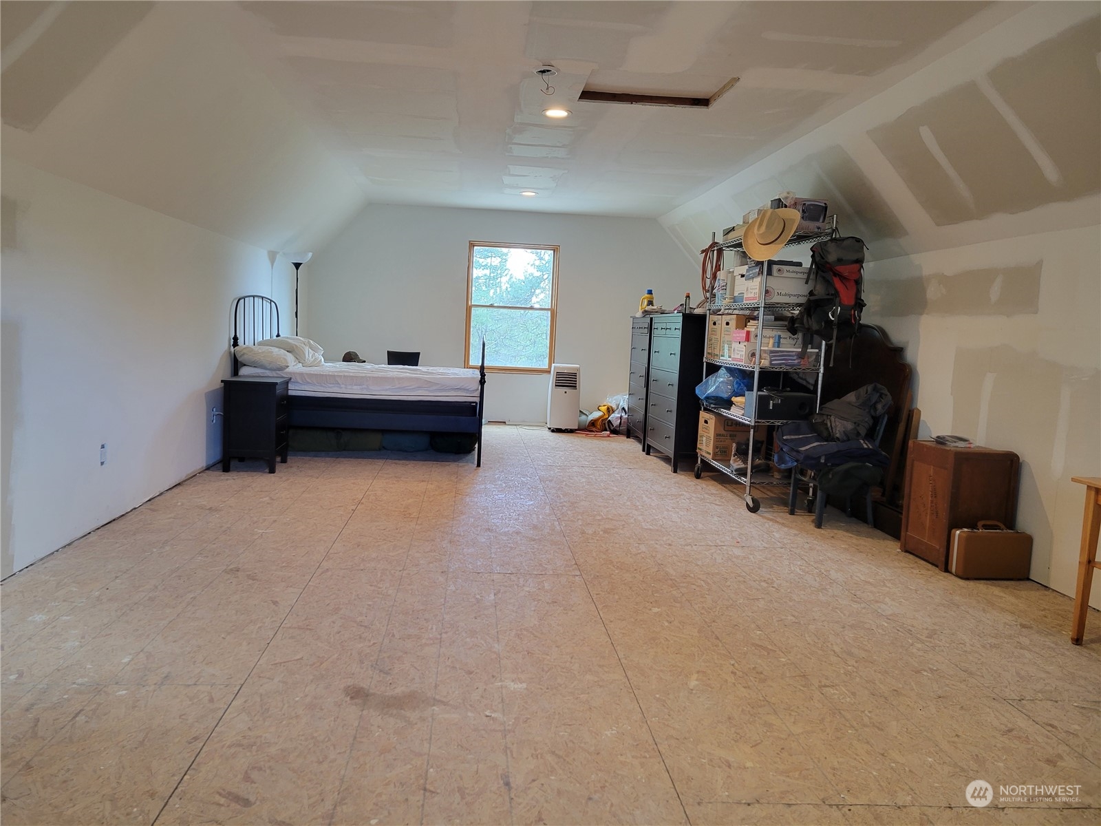 5099 M Allen Road Springdale, WA 99173 - Photo 11 of 38 a view of a big room with air conditioner duct and materials on floor