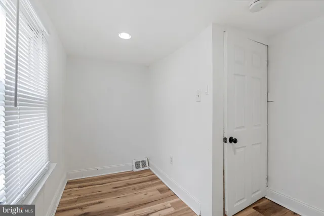 a view of small space with wooden floor