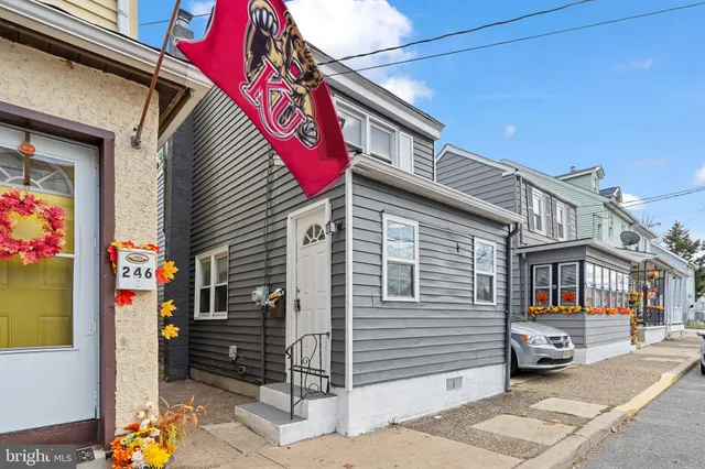 a front view of a house with a garage