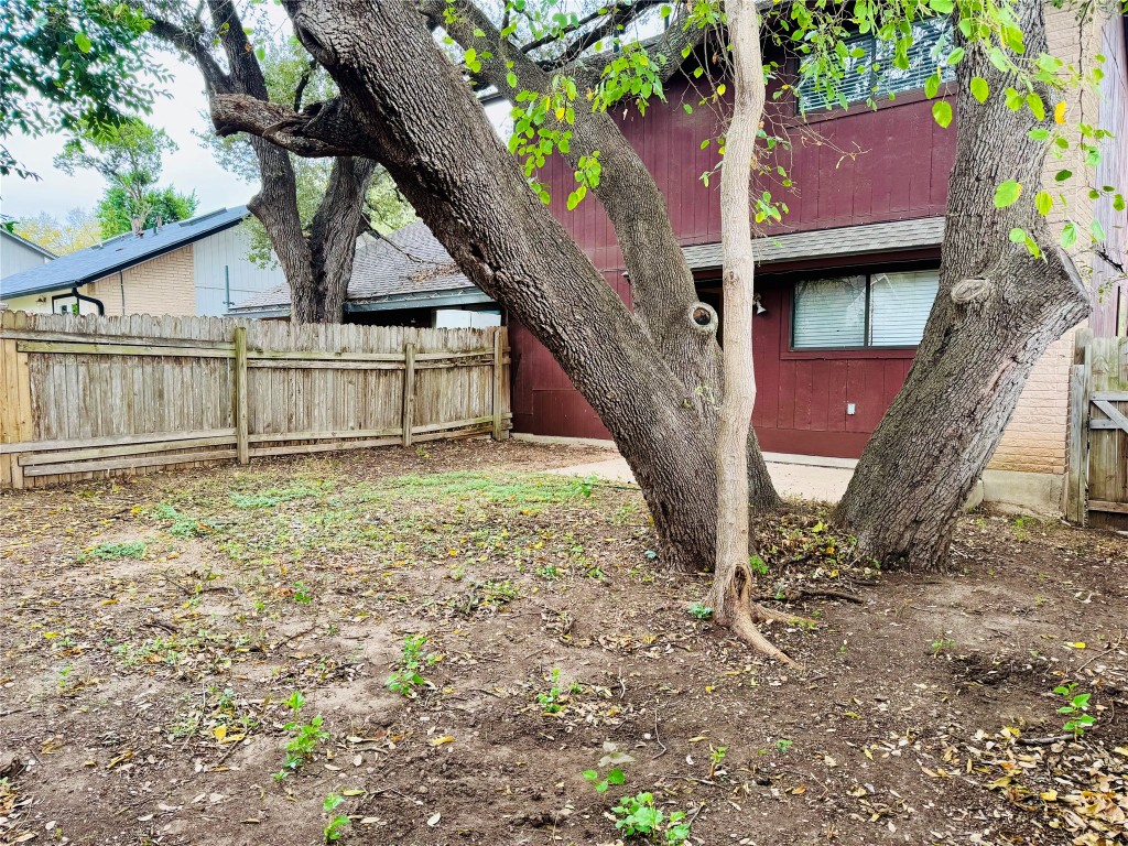 907 Milford Way, Unit A Austin, TX 78745 - Photo 16 of 16 a view of a house with a yard