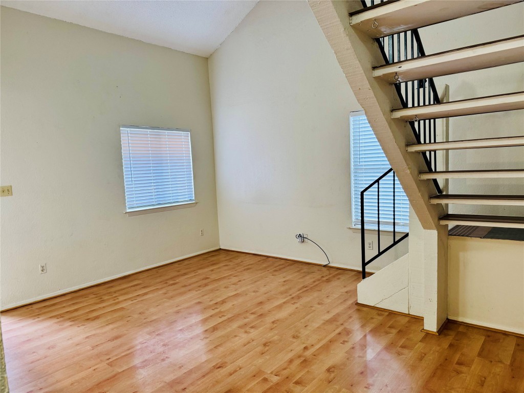907 Milford Way, Unit A Austin, TX 78745 - Photo 5 of 16 a view of an entryway with wooden floor
