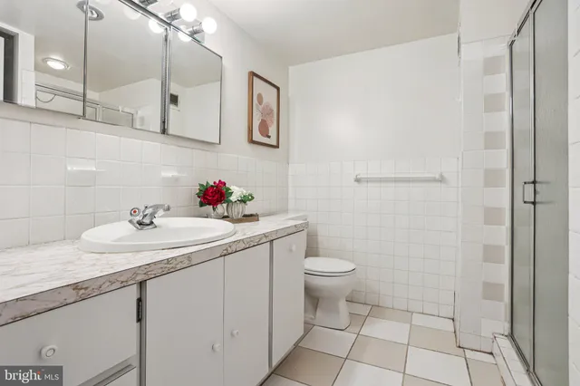 a bathroom with a sink toilet and vanity