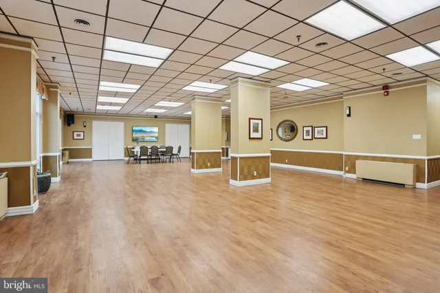 a view of a livingroom with wooden floor