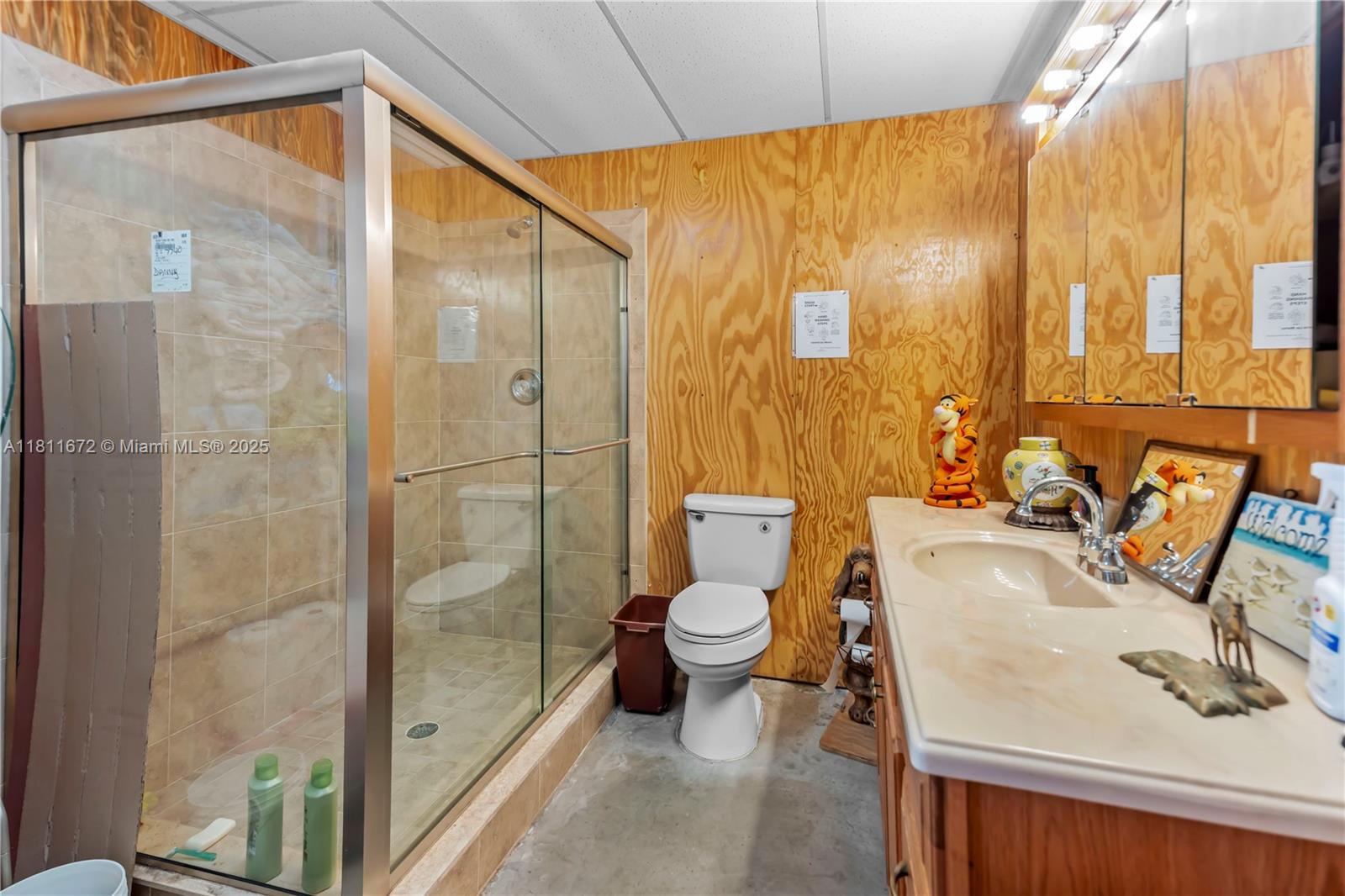 4077 Southwest 121st Terrace Davie, FL 33330 - Photo 19 of 85 a bathroom with a sink toilet and shower