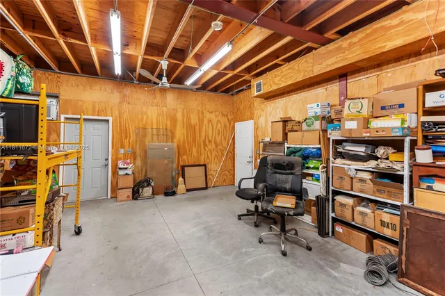 a room with gym equipment and a large window